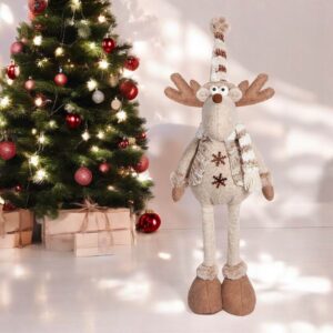 Kalėdų figūra pilnai ištiestomis teleskopinėmis kojomis. Didelis nykštukas aukštis siekia 60 cm+.
